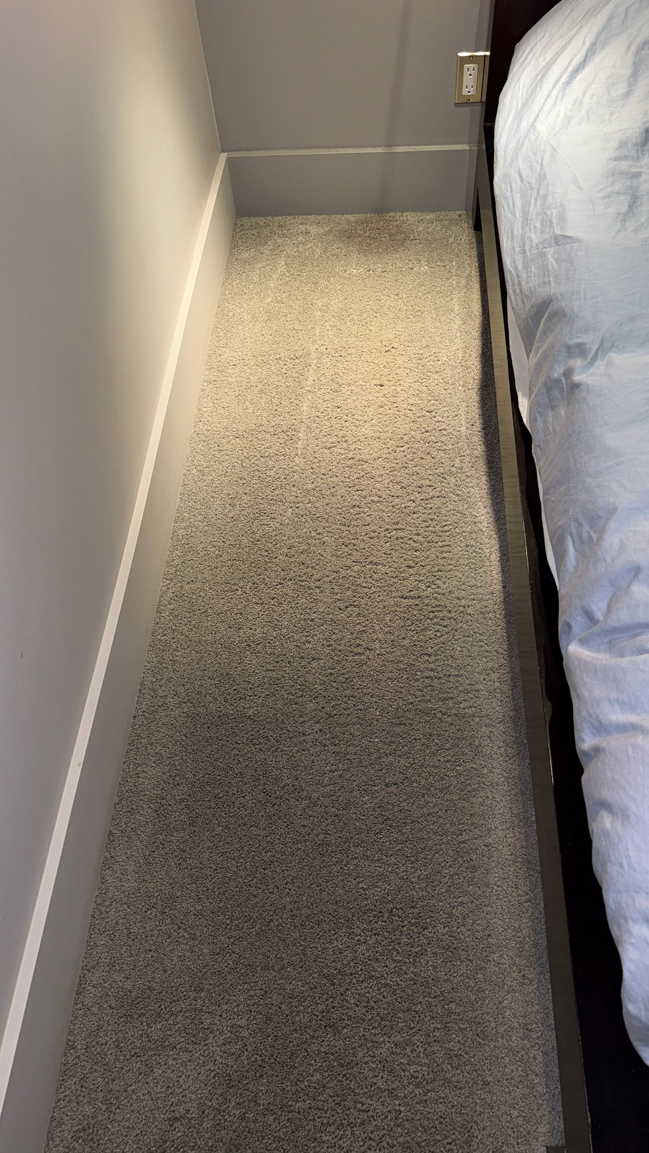 Bedroom carpet fully restored after red wine and baking soda residue removal by BreezeCo in Kelowna